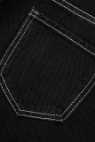 Schwarze Patchwork-Denim-Jeans mit lässigem Print