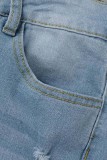 Vaqueros pitillo de cintura alta con retazos rasgados sólidos informales azul profundo