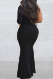 Schwarzes, elegantes, solides Patchwork mit heißem Bohrer und langem Kleid mit schrägem Kragen