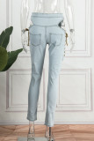 Jeans skinny in denim a vita media con frenulo strappato casual blu chiaro