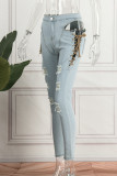 Ljusblå Casual Solid Ripped urholkad Frenulum Mid Waist Skinny Denim Jeans