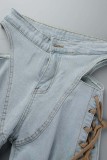 Hellblaue, lässige, solide, ausgehöhlte Frenulum-Denim-Jeans mit mittlerer Taille