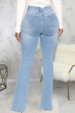 Jeans de mezclilla con corte de bota de cintura alta de patchwork rasgado sólido informal azul