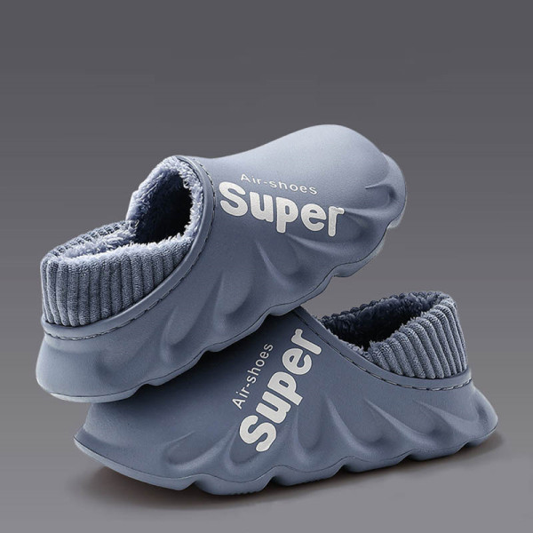 La impresión redonda de la letra viva informal azul gris mantiene los zapatos cómodos calientes