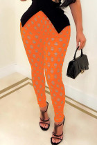 Pantaloni a matita a vita alta skinny strappati casuali sexy arancioni strappati