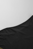Schwarzes, elegantes, solides Patchwork mit heißem Bohrer und langem Kleid mit schrägem Kragen