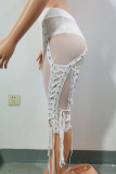 Witte mode sexy patchwork patchwork doorzichtige riem ontwerp magere halfhoge taille broek