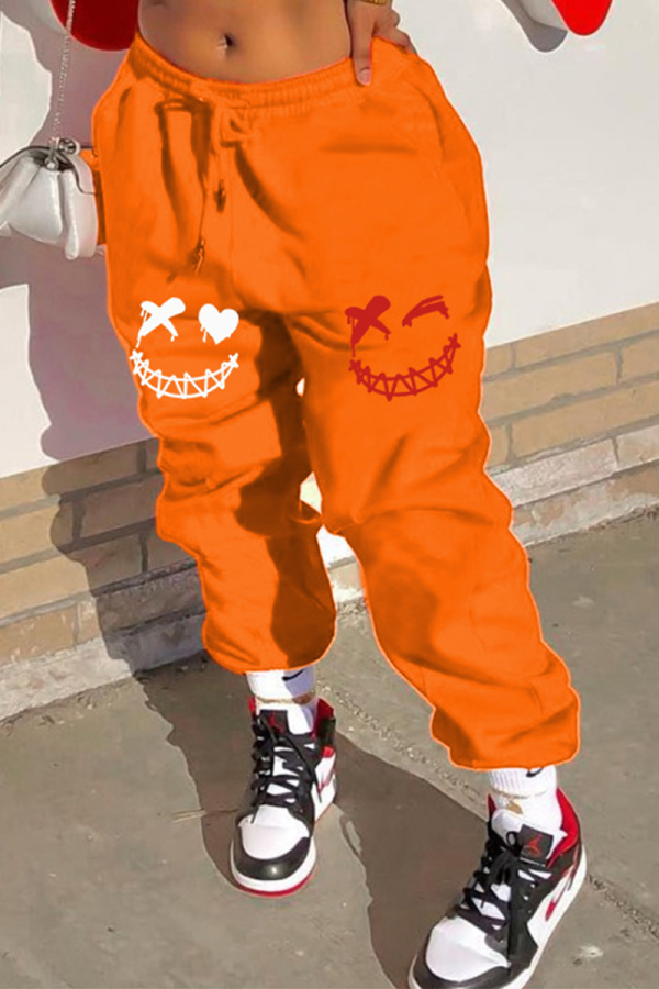 Pantaloni con stampa di posizionamento Harlan a vita media con cordoncino con stampa arancione Street