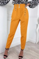 Calças lisas casuais amarelas regulares de cintura alta convencionais de cor sólida