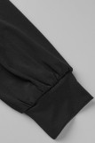 Robes asymétriques noires sexy à col en V et à plis solides
