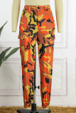 Оранжевые повседневные брюки с камуфляжным принтом, обычные маленькие эластичные брюки-карандаш со средней посадкой