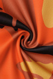 Pantalones de lápiz de cintura media elásticos pequeños regulares con estampado de camuflaje estampado casual naranja