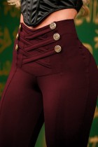 Pantalones pitillo de cintura alta con retazos lisos informales burdeos color sólido