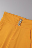 Bottoni solidi casual gialli Pantaloni a tinta unita convenzionali a vita alta regolari