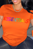 T-shirt con collo a O con stampa patchwork arancione Street