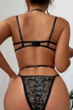Zwarte sexy geborduurde uitgeholde patchwork doorzichtige rugloze lingerie