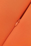 Оранжевые элегантные однотонные платья в стиле пэчворк с косым воротником и аппликацией