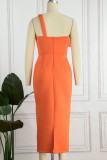 Оранжевые элегантные однотонные платья в стиле пэчворк с косым воротником и аппликацией