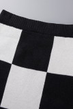 Pantaloni a stampa intera dritti a vita alta con spacco patchwork con stampa scozzese nera