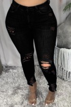 Jeans de talla grande rasgados sólidos casuales de moda negra