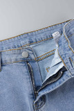 Jeans in denim a vita alta patchwork con stampa scozzese nera