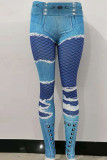 Pantaloni blu con stampa di posizionamento a matita a vita alta patchwork con stampa casual da strada blu