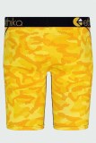 Pantalones de lápiz de cintura baja con letras de retazos con estampado sexy amarillo