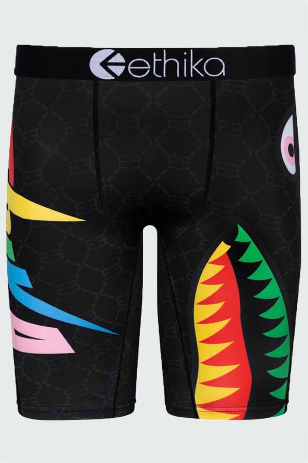 Pantalones de lápiz con letras de patchwork con estampado callejero negro