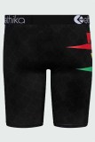 Разноцветные брюки-карандаш с принтом в стиле пэчворк и буквами