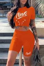 Tangerine Red Casual Sportswear Print Bandage Patchwork O-Ausschnitt Kurzarm Zweiteiler