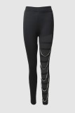 Black Sexy Casual Solid Hollowed Out Chains Skinny High Waist Pencil Solid Color Trousers