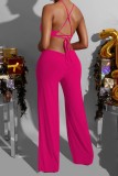 Rose Red Sexy Casual Solid Backless Cross Bandjes O Neck Regular Jumpsuits