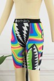 Pantaloni a matita con lettere patchwork con stampa stradale multicolore