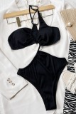 Svarta sexiga solida rygglösa asymmetriska badkläder (med vadderingar)