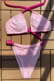 ピンクのセクシーな無地の包帯パッチワーク バックレス水着 (パディング付き)