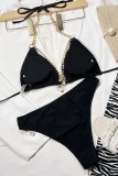 Trajes de baño sin espalda con cadenas de vendaje sólido sexy negro (con rellenos)