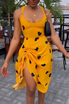 Amarillo sexy estampado vendaje patchwork dibujar cuerda cuello en u una línea de vestidos