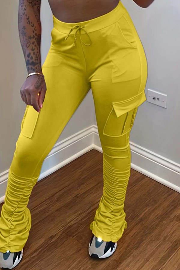 Pantalones de color sólido convencional de cintura alta con pliegues de patchwork sólido informal amarillo