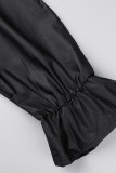 Robes à manches longues noires décontractées solides évidées à col rond