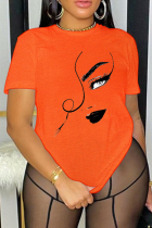 Oranje casual T-shirts met patchwork en O-hals