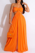 Orange Sexy Solid Patchwork Backless Halfter Straight Jumpsuits