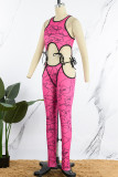 Rose Red Sexy Casual Print Bandage Uitgeholde O Neck Skinny Jumpsuits