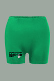 Pantalones casuales con estampado de patchwork de cintura alta con estampado de posicionamiento de lápiz verde