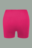 Pantalones con estampado de posicionamiento de lápiz de cintura alta con estampado informal de color rojo rosa
