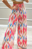 Pantalones holgados de cintura alta con estampado de patchwork multicolor y pierna ancha con estampado completo