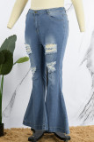 Calça jeans plus size rasgada casual azul bebê