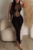 Zwarte sexy patchwork doorzichtige skinny jumpsuits met ronde hals