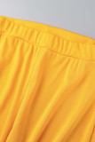 Gelbe lässige Sportbekleidung Solide Patchwork Reißverschluss Kapuzenkragen Langarm Zweiteiler