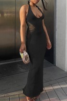 Zwarte sexy effen uitgeholde rugloze halter lange jurkjurken