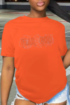 T-shirts à col rond et patchwork à imprimé rue orange